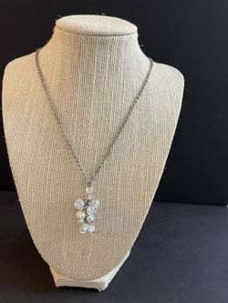 Silver tone necklace with sparkly crystal pendant 21” inches long