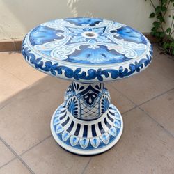 Front Gate Maiolica Chinoiserie Style Heavy Duty Resin Plastic Umbrella Patio Table, finish on top is flaking in some spots.  25x25x27in
