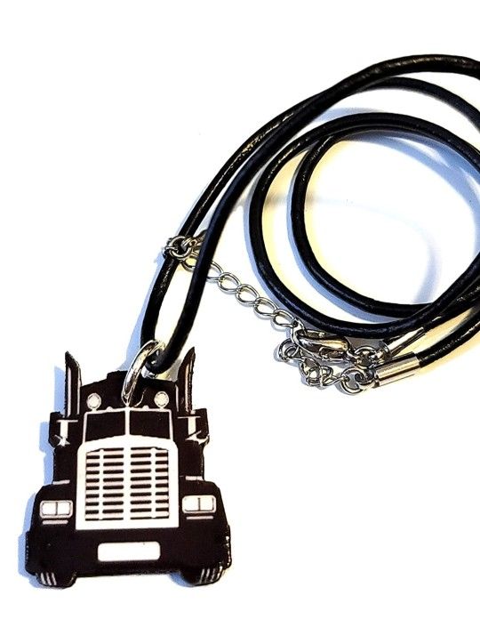 LITTLE TRUCK CHOKER PENDANT THAT MEASURES 1.5X1 INCH