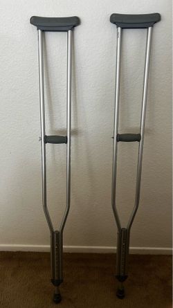Adult adjustable crutches )5’10”-6’6”) like new