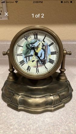 Antique Clock, wind up second hand is monkey shaving the man