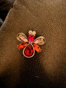 Red and orange butterfly brooch