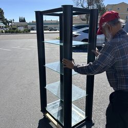 Bell'O AR 711 audio tower, featuring a black steel frame and tempered glass shelves designed for organizing audio/video components