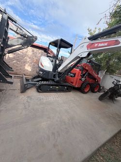 Excavator and skid steer
