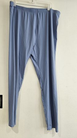 Light blue leggings.  Size 5XL
90% polyester 
10% spandex