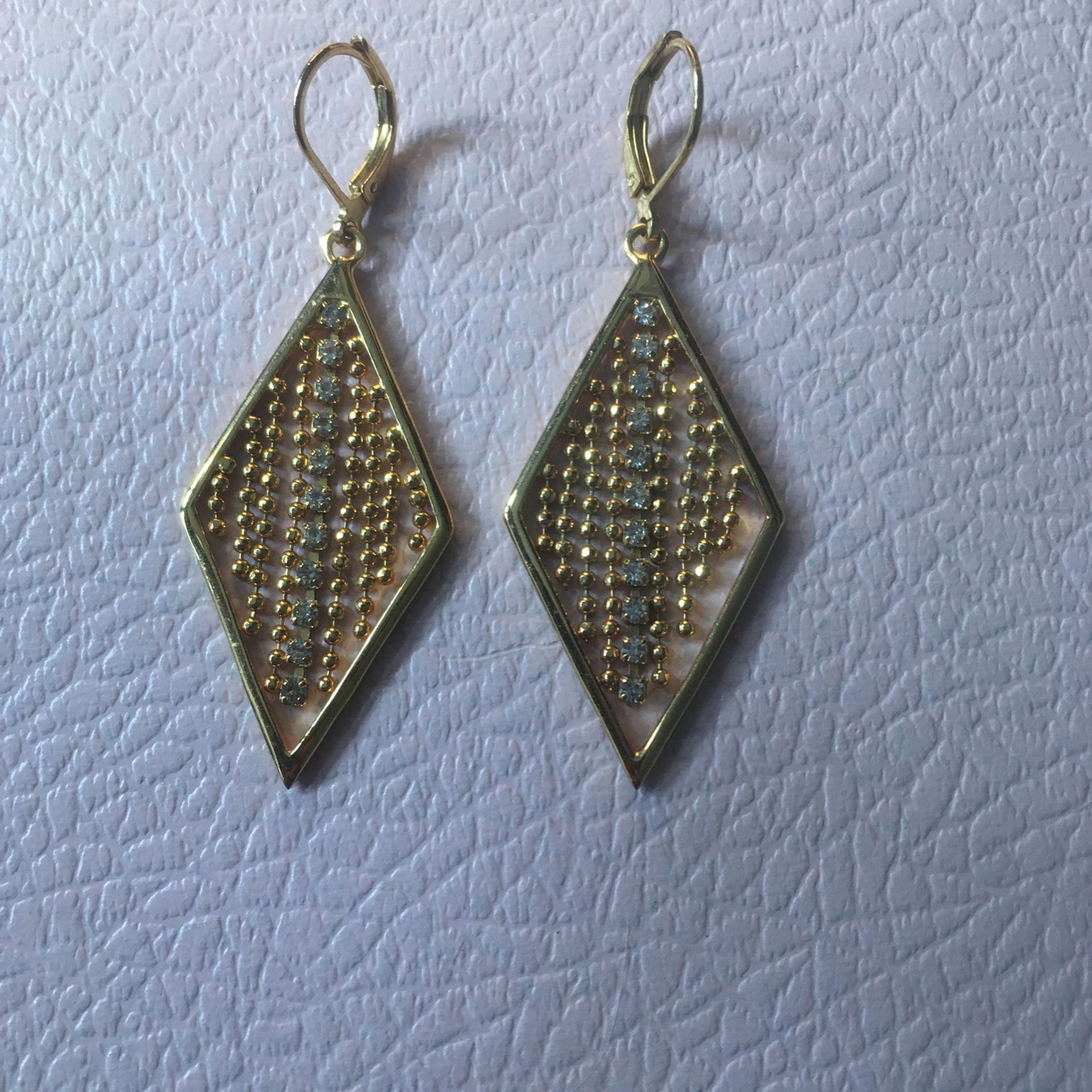 Dangling Gold And Diamond Earrings