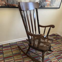 Vintage Dark Finish Windsor Style Spindle-Back Rocking Chair.