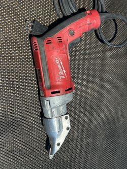 Cut metal shear