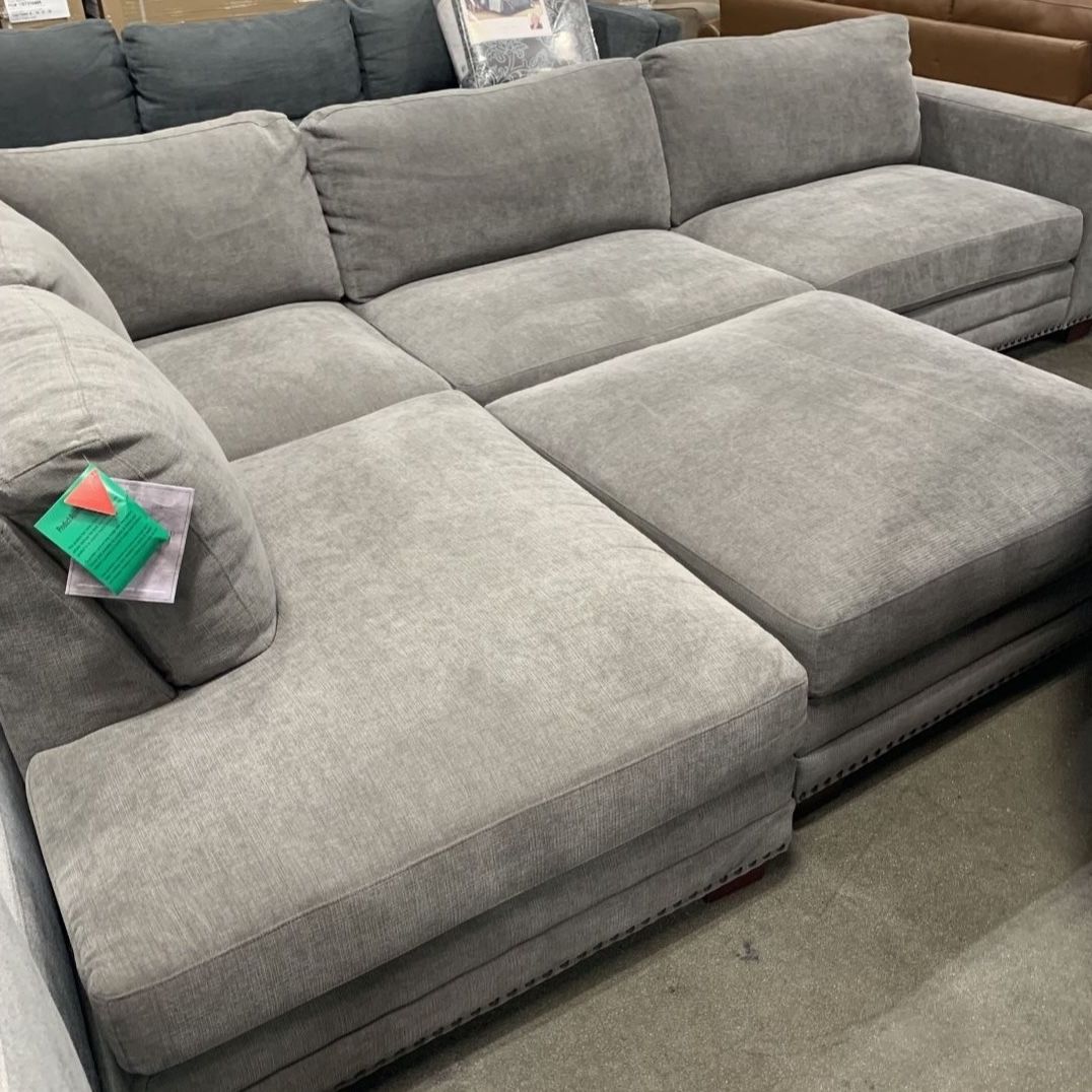Penelope fabric sectional with cheap ottoman