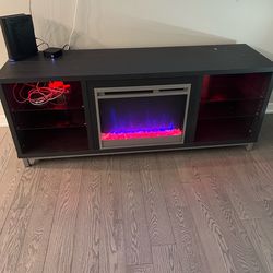 Tv stand with built in fireplace with heat