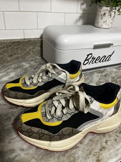 Gucci Sneakers With Navy Blue And Yellow And A Little Bit Of Pink On The Bottom