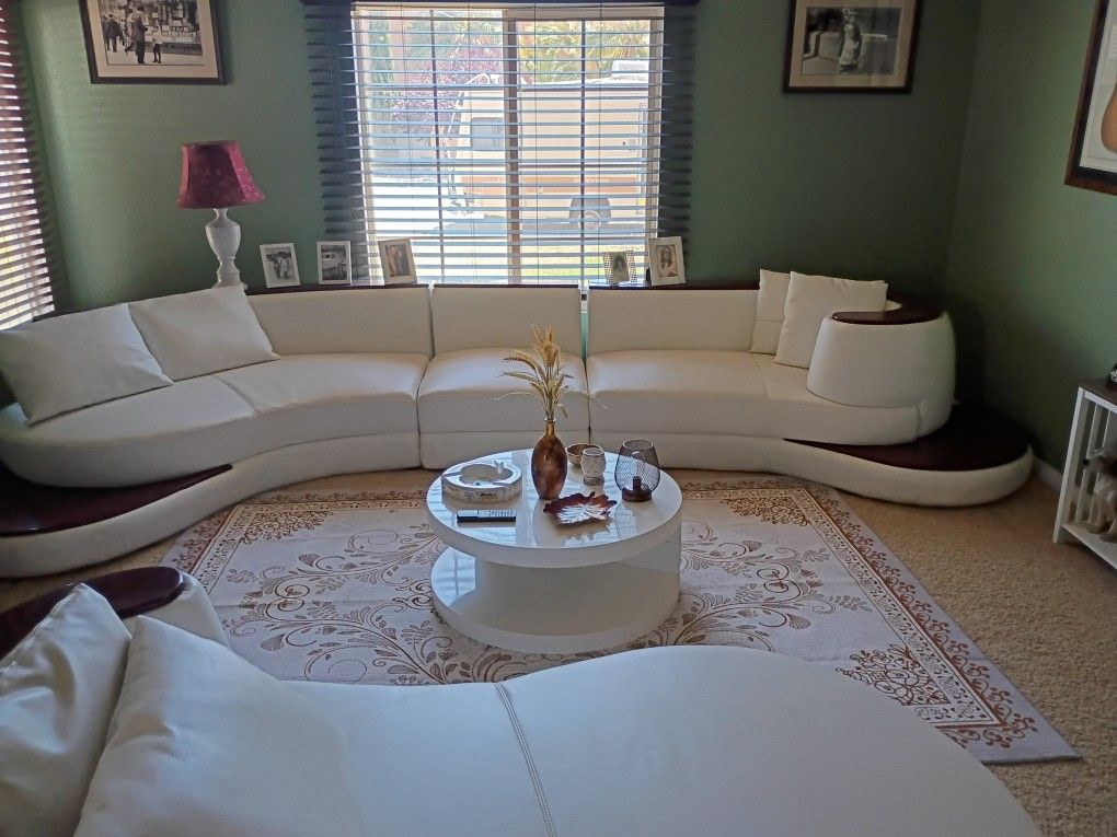 Beautiful White Italian Leather Couches With Solid Wood Trim. Seat Six Round Matching Coffee Table Included