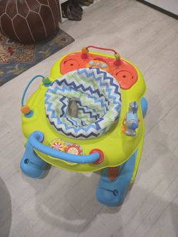 Delta Children 4 In 1 Discover And Play Musical Walker- 360 Degree Swivel