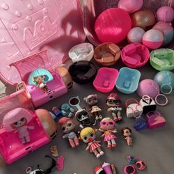 L.O.L Surprise! Lot!!  A bundle of LOL collectable items with A Big Pink Container