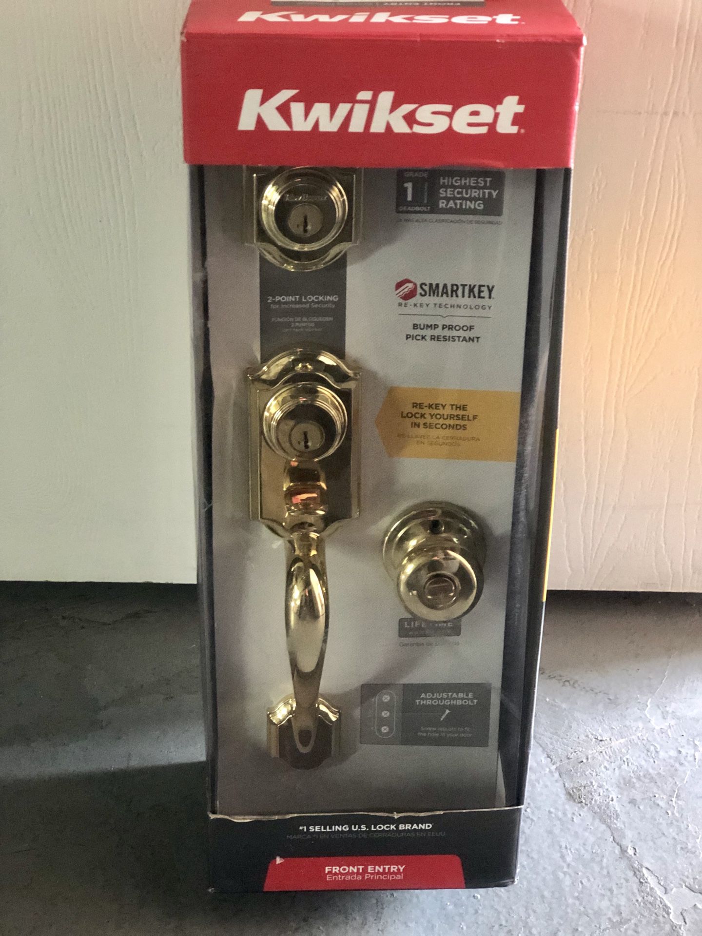 Kwikset polished brass handleset with Juno Entry Knob