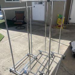 (3) Clothing Racks