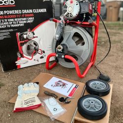RIDGID
K-400 Drain Cleaning Snake
Auger 120-Volt Drum
Machine with C-32 W 3/8 in. x 75 ft. Cable + 4-Piece Tool Set & Gl