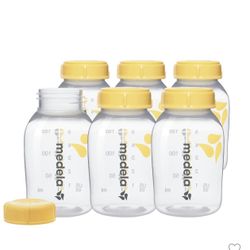 Medela Breast Milk Containers And Storage Bottles With solid lids 