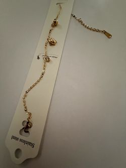 Stainless steel gold toned Medusa styled bracelet
