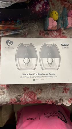 Wearable cordless breast pump