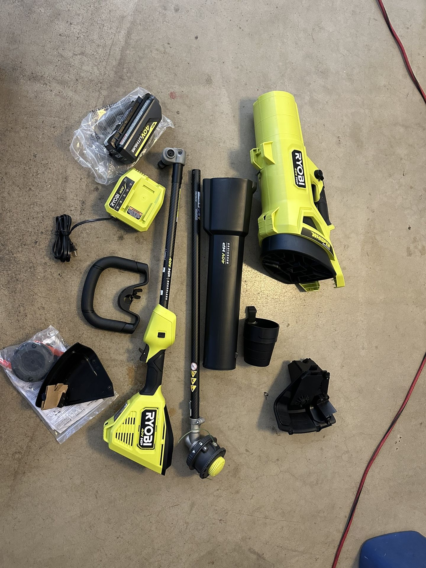 RYOBI 40V HP Brushless 650 CFM 160 MPH Cordless Leaf Blower and Carbon Fiber String Trimmer Kit