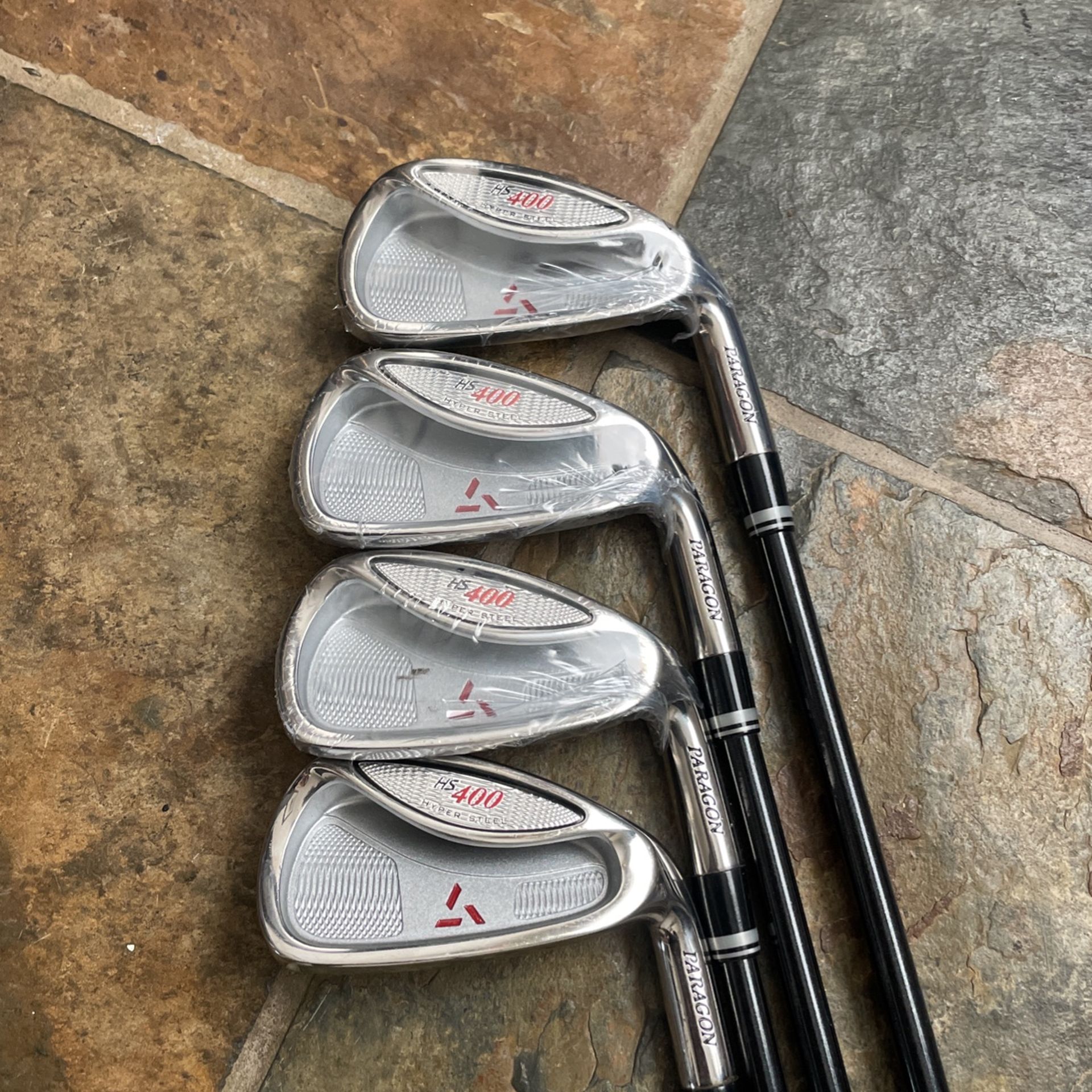 Paragon Golf clubs. Brand New. 7-4 Irons. RH