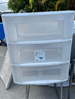 3-drawer plastic chest, clean and in good condition; measures 22 inches long, 15 inches wide, and 25 inches high.