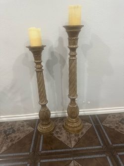 Pair of tall floor candle holders