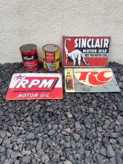 Vintage oil, cans, and signs