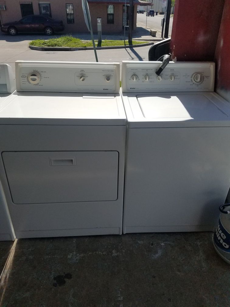 Top load regular capacity washer and dryer set