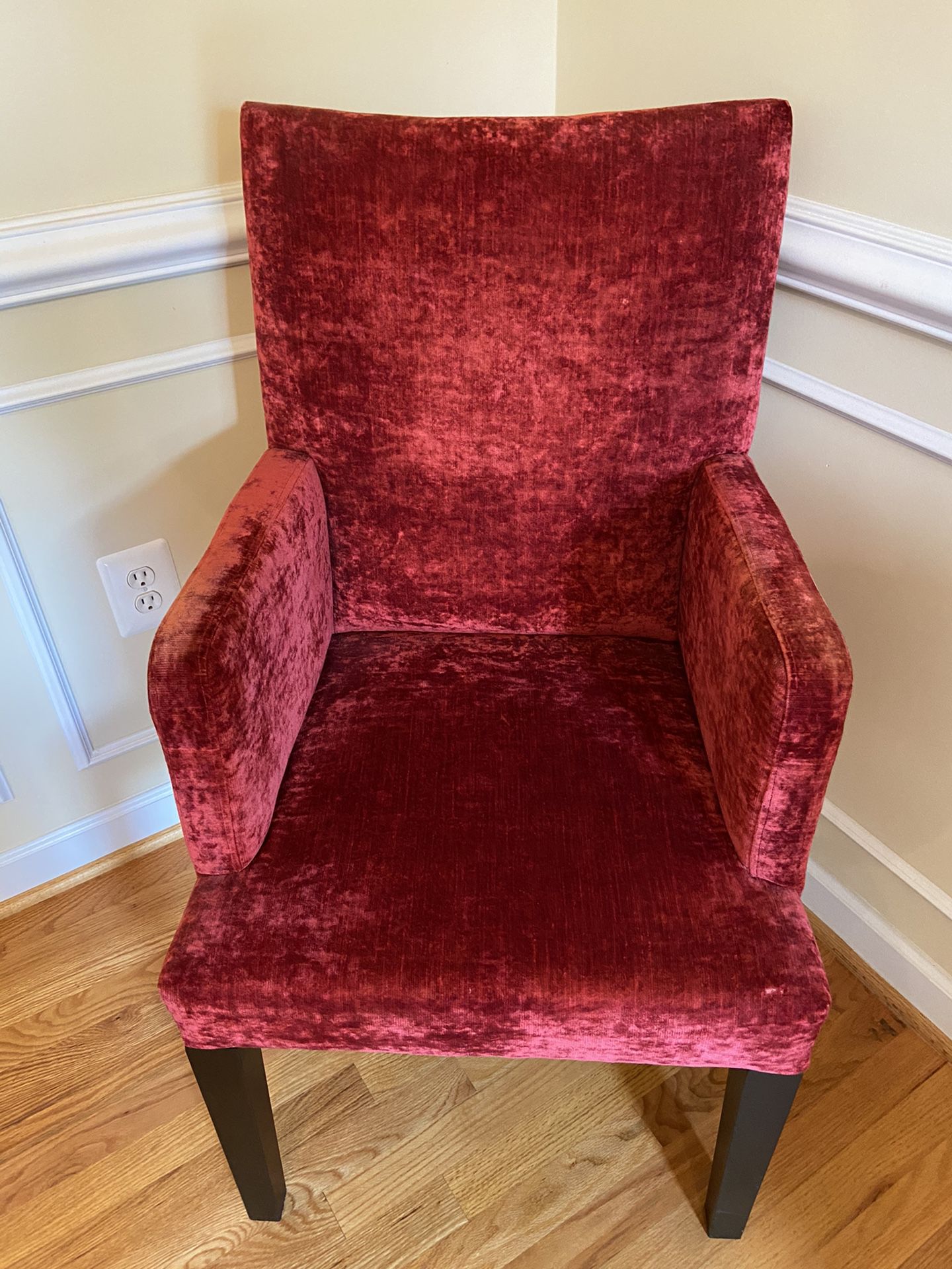A pair of velvet armchairs