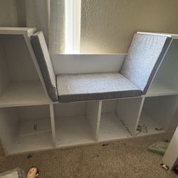 Kids bookshelf with reading book