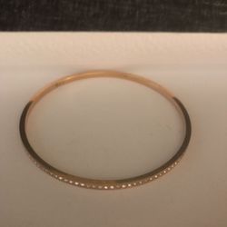Gold and diamonds bracelet pre-own size:xs