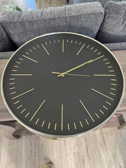 Black and gold Clock
