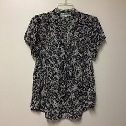 Women’s PLEIONE (Anthropologie) 100% polyester black & off-white short sleeve top… Size large