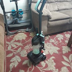 Small Bissel Vacuum With Attatchments.  Works Great