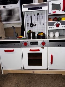 will trade for a kids activity table or a kids table with one chair Play Kitchen/ will trade for a kids activity table or a Kids table with one chair