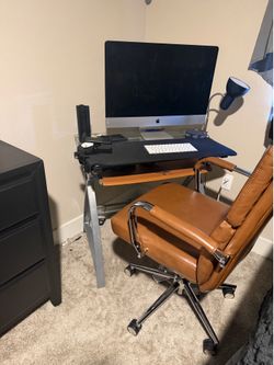 Desk, Apple computer and chair