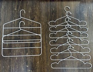 Clean, Classic white IKEA STAJLIG and GARDSMASTARE Metal Clothes Hangers