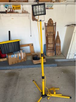Work light adjustable to 66”