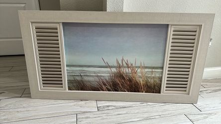 Beige wood frame picture