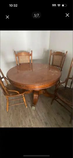 Antique solid oak claws table with chairs