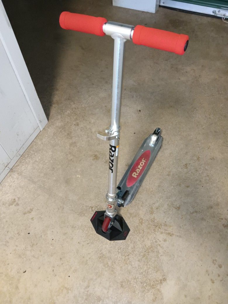 Razor Scooter With Upright Stand
