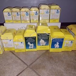 Adorable Precious Moments Birthday Train figurine set. Has all 14 pieces, from 'For Baby' through 'Thirteen Year Old'. Each figurine is in its origina