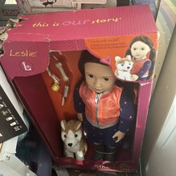 Girls Playing Doll With Two Sets Of Clothing 