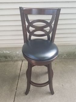 Bar height spinning wooden chair