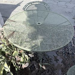 Vintage wrought Iron Table  With Chairs 