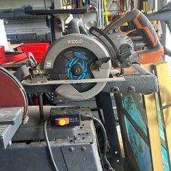 Flat belt, disc grinder and a worm drive Ridgid 7 1/4 inch saw