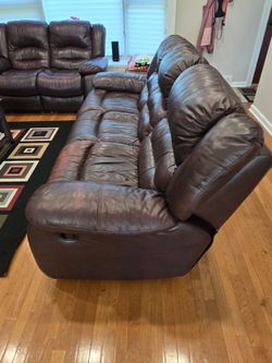 Brown Leather reclining sofa set.