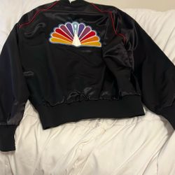 NBC black satin jacket with a pick up in the back.